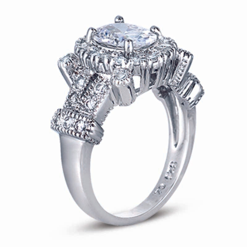STERLING SILVER RING WITH A ROUND CENTER CZ STONE