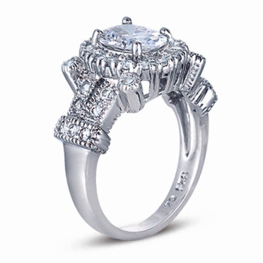 STERLING SILVER RING WITH A ROUND CENTER CZ STONE