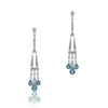 14K White gold dangle earrings with diamonds and blue topaz