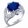 STERLING SILVER RING WITH BLUE AND CLEAR CZ STONES