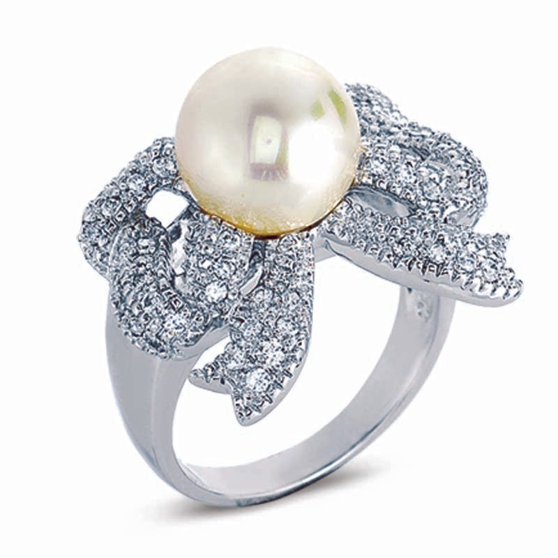 STERLING SILVER BOW RING WITH PEARL AND CZ STONES