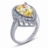 STERLING SILVER RING WITH YELLOW CENTER AND CLEAR CZ STONES